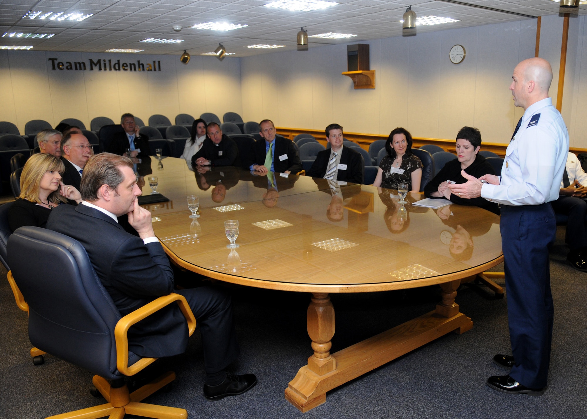 RAF MILDENHALL, England – Col. Chad Manske, 100th Air Refueling Wing commander, welcomes the newest Honorary Commanders during a briefing in the wing conference room May 12. (U.S. Air Force photo/ Staff Sgt. Jerry Fleshman)