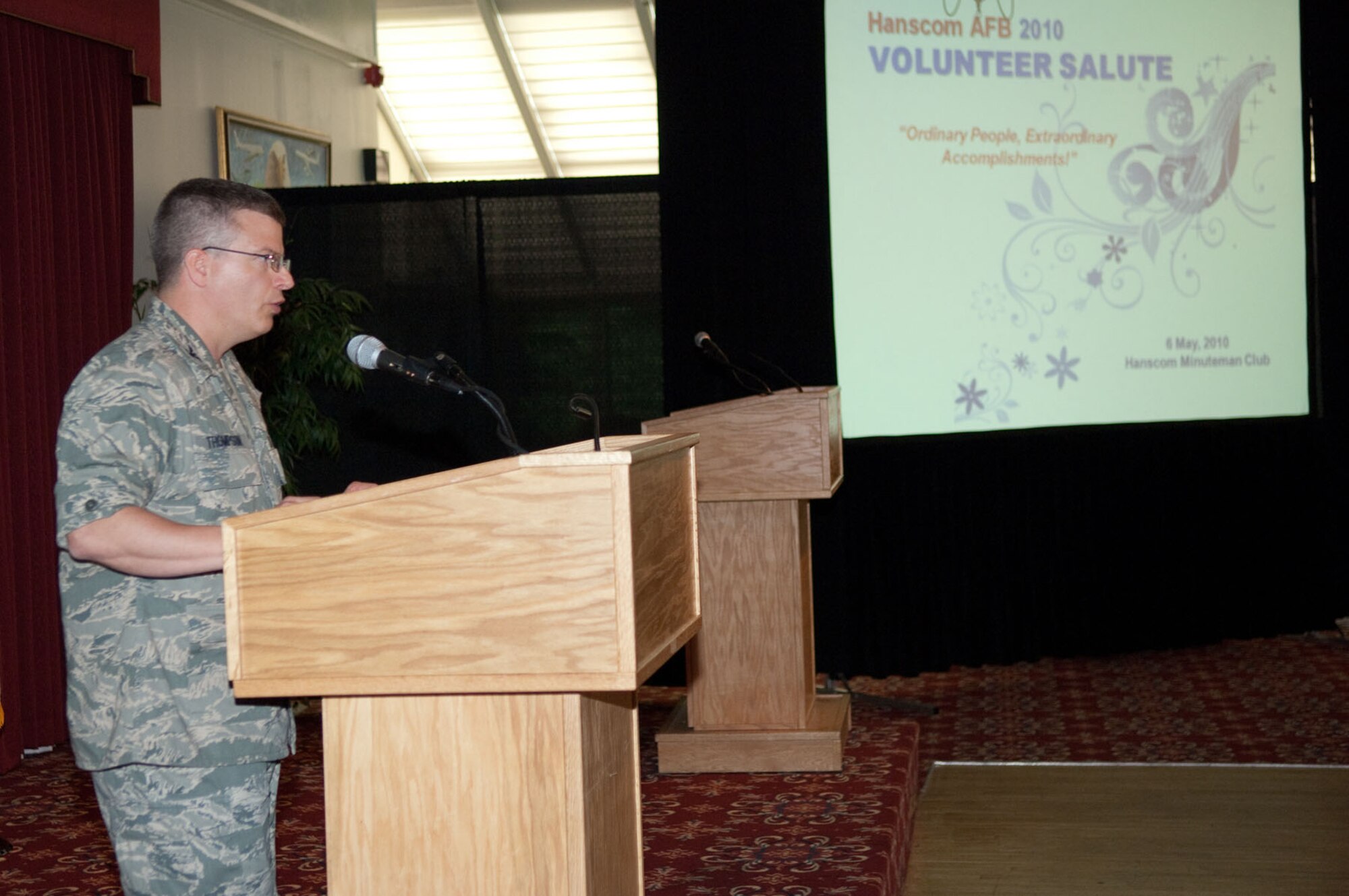 HANSCOM AIR FORCE BASE, Mass. – Col. Charles F. Thompson, 66th Air Base Wing commander, speaks during the Volunteer Salute on May 6 at the Minuteman Club. The salute honored volunteers who donate their time to Hanscom Air Force Base. (U.S. Air Force photo by Rick Berry)