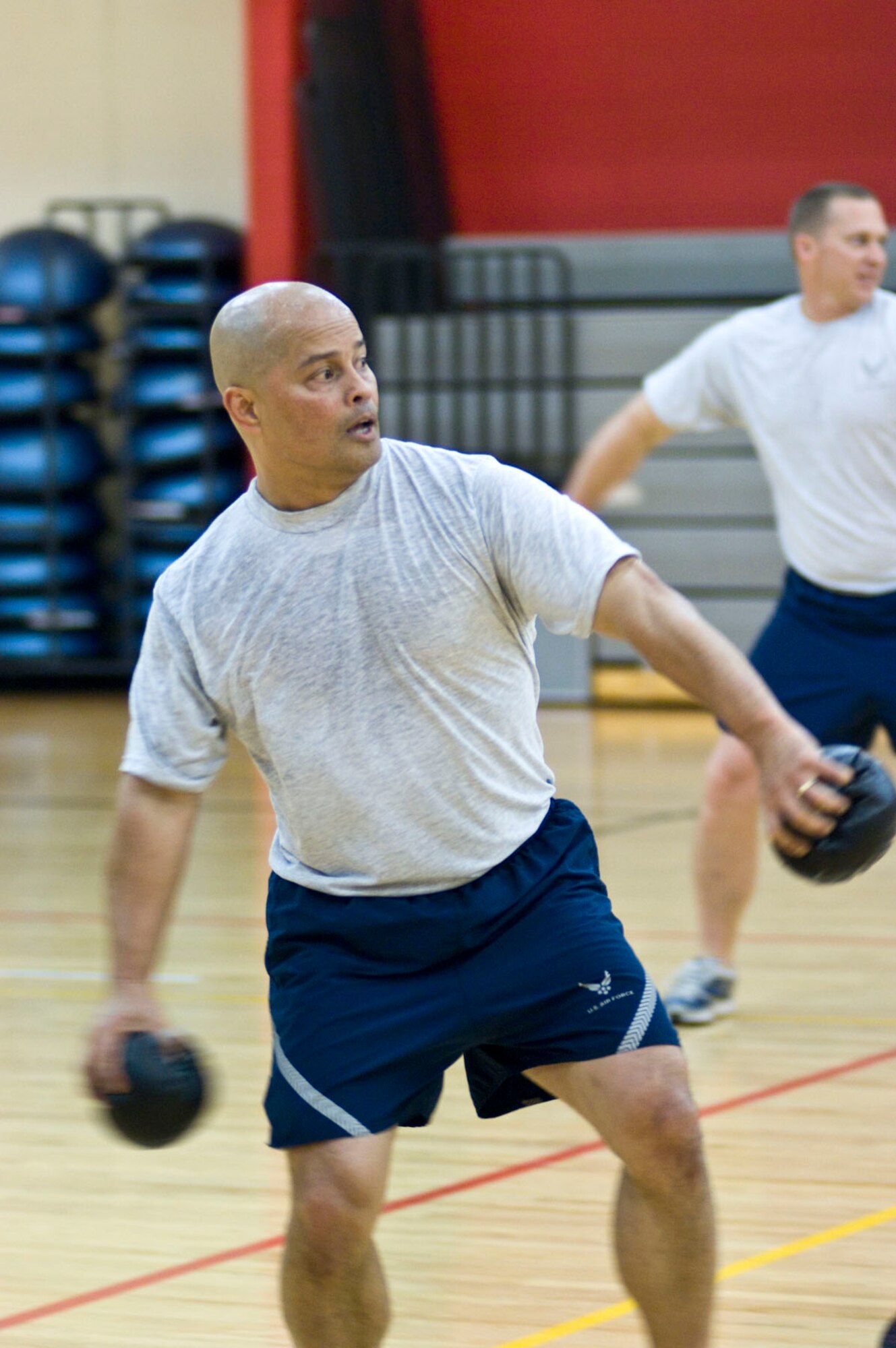 HANSCOM AIR FORCE BASE, Mass. – Chief Master Sgt. Glenn Taijeron prepares to throw the ball during a heated game of dodge ball between the Chiefs and Eagles as part of the Hanscom Olympics. ESC Staff won both the Olympics and the Commander's Cup. The 66th ABW came in second and the 653rd Electronic Systems Wing placed third. (U.S. Air Force photo by Rick Berry)