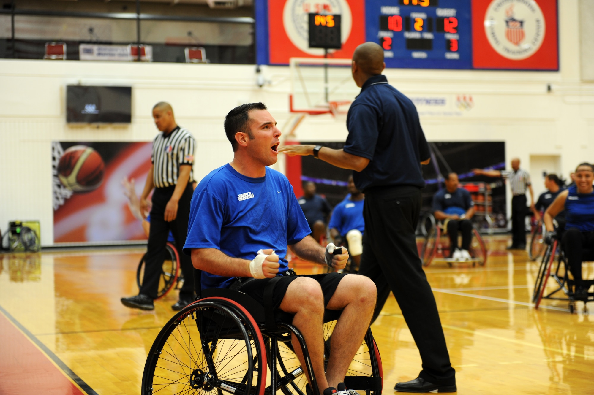 Christopher D'Angelo yells after making a point in a basketball game during the Warrior Games bronze medal match against the Navy May 12, 2010 at the Olympic Training Center, Colorado Springs. The Air Force went on to win the game 13-10. The Warrior Games competition began May 10 and finishes on May 14, 2010 at the U.S. Olympic Training Center in Colorado Springs. (U.S. Air Force photo/Staff Sgt. Desiree N. Palacios)
