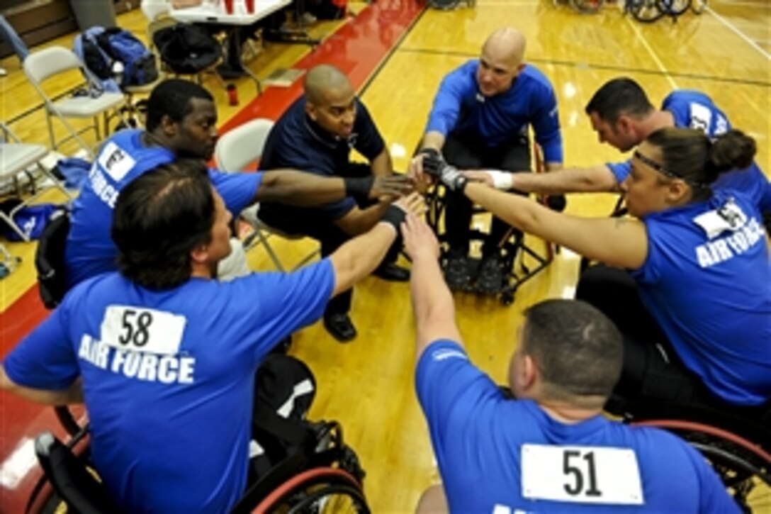 Team Air Force throws their hands in for a quick cheer before playing the Warrior Games bronze medal game against the Navy at the Olympic Training Center, Colorado Springs, Colo., May 12, 2010. The Air Force went on to win the game 13-10.