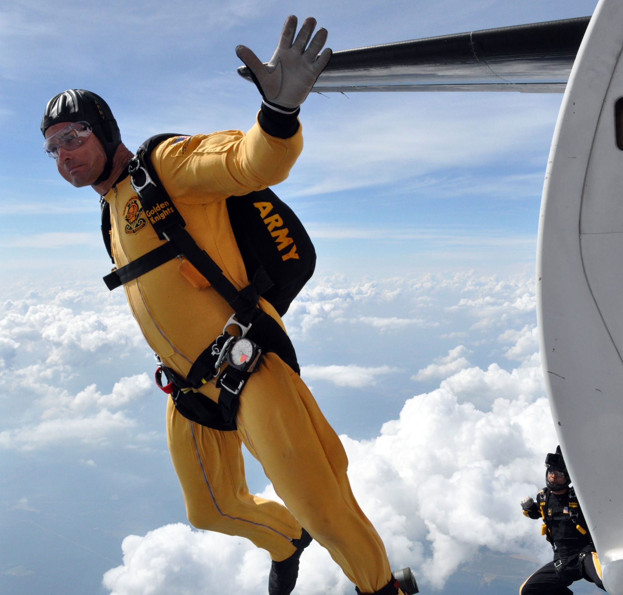 A member of the U.S Army Golden Knights jumps during a practice demonstration at Columbus Air Force Base May 14. The Golden Knights are taking part in this years base air show and open house, Wings over Columbus 2010. (U.S. Air Force photo/Senior Airman Jacob Corbin)