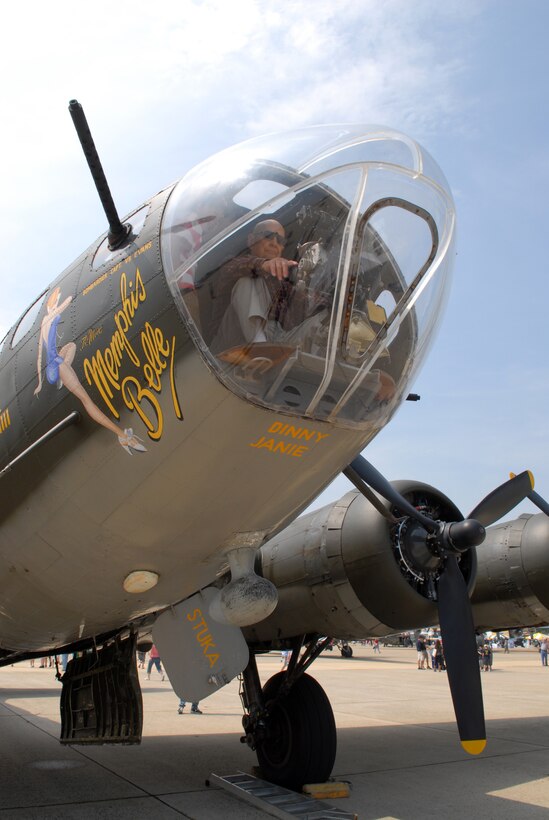 100514-N-9565D-067 JOINT BASE ANDREWS, Md. (May 14, 2010) - U.S. Army Air Corps Lt. Col. Roy Truba (Ret.), a B-17 bombardier for the 751st squadron, 351st bomb group during World War II, speaks to child aircraft enthusiast about his flying experiences during WWII in the aircraft named "Memphis Belle."  Trumba was shot down Apr. 18, 1945, and held six weeks as a POW and had not been inside a B-17 since bailing out over Germany.  This is the first Joint Service Open House conducted by Team Andrews members at the newly minted Joint Base Andrews, continuing a rich tradition of parternship and strength rooted in service to the nation.  (U.S. Navy photo by Mass Communication Specialist 2nd Class Clifford L. H. Davis)