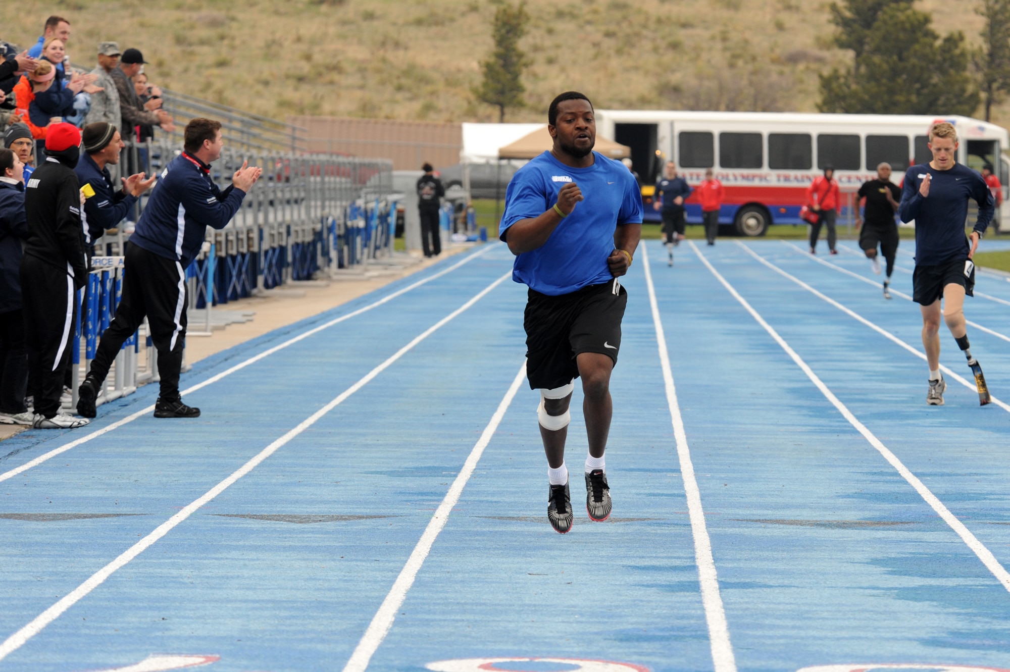 Air Force team member Matt Sanders competes in a track event during the Warrior Games at the U.S. Air Force Academy track in Colorado Springs, Colo., May 14, 2010. Sanders led the Air Force track and field team with three medals, earning a gold in the 400-meter and the 200-meter races and a silver in the 100-meter sprint.  (U.S. Air Force photo/Staff Sgt. Desiree N. Palacios)