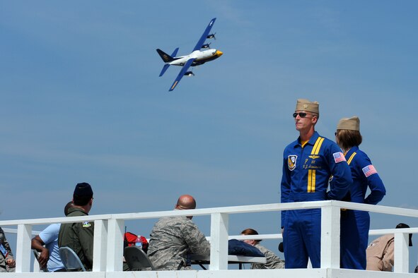 Joint Base Andrews, Md. -- Navy Lieutenant C.J. Simonsen, pilot for Blue Angels number seven F/A 18 Hornet, commentates as “Fat Albert” passes by at the 2010 Joint Service Open House here May 14. The Blue Angels are one of the many performances slotted for this year’s show.  JSOH offers an opportunity for the public to see military equipment from the Navy, Marines, Army, Air Force, and Coast Guard. (U.S. Air Force photo by Staff Sgt Melissa Stonecipher)