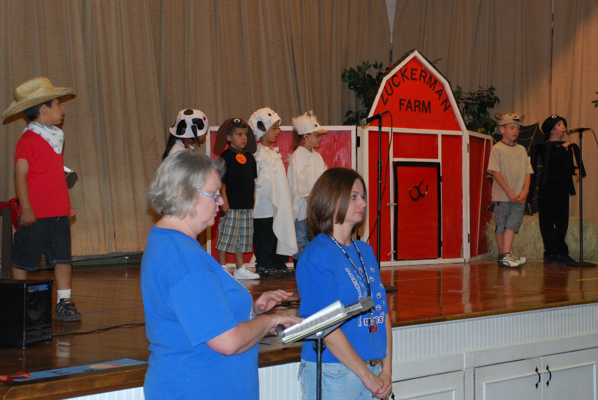 Students from the Cunningham Elementary School Deaf Education Program perform their version of “Charlotte’s Web” for all of Sheppard Elementary School’s students and faculty May 13, 2010.  The Deaf Education Program students sang the national anthem and performed the play “Charlotte’s Web” for Sheppard Elementary School to demonstrate their form of communication, sign language.  (U.S. Air Force photo/Tech Sgt. Vernon Cunningham)