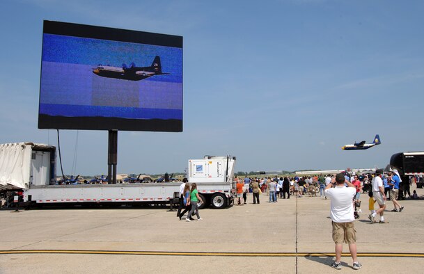 JOINT BASE ANDREWS, Md. -- The crowd watches the sky for the Blue Angels “Fat Albert” at the 2010 Joint Service Open House here May 14. This year’s event will have demonstrations by the Navy Blue Angels and the Army Golden Knights. JSOH is planned and conducted by Total Force; Active, Guard, Reserve, Civilian employees, as well as retirees and families. (U.S. Air Force photo by Staff Sgt. Christopher A. Marasky)