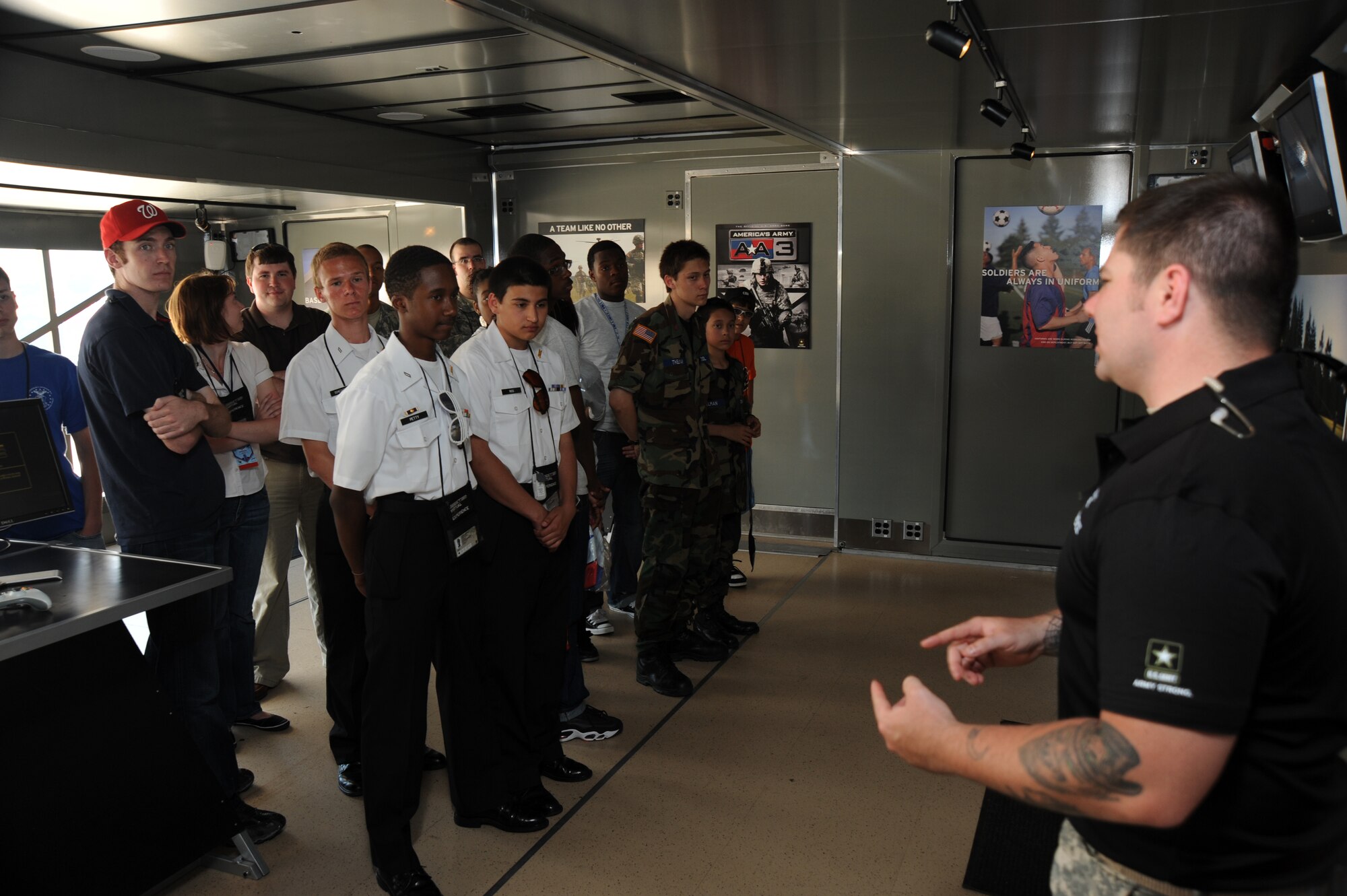 JOINT BASE ANDREWS, Md. – Guests get a briefing before their turn in the Virtual Army Experience during the Joint Service Open House here May 14.  JSOH allows members of the public an excellent opportunity to meet and interact with the men and women of the Armed Forces and to show them America’s skilled military. (U.S. Air force photo by Staff Sgt. Christopher A. Marasky)