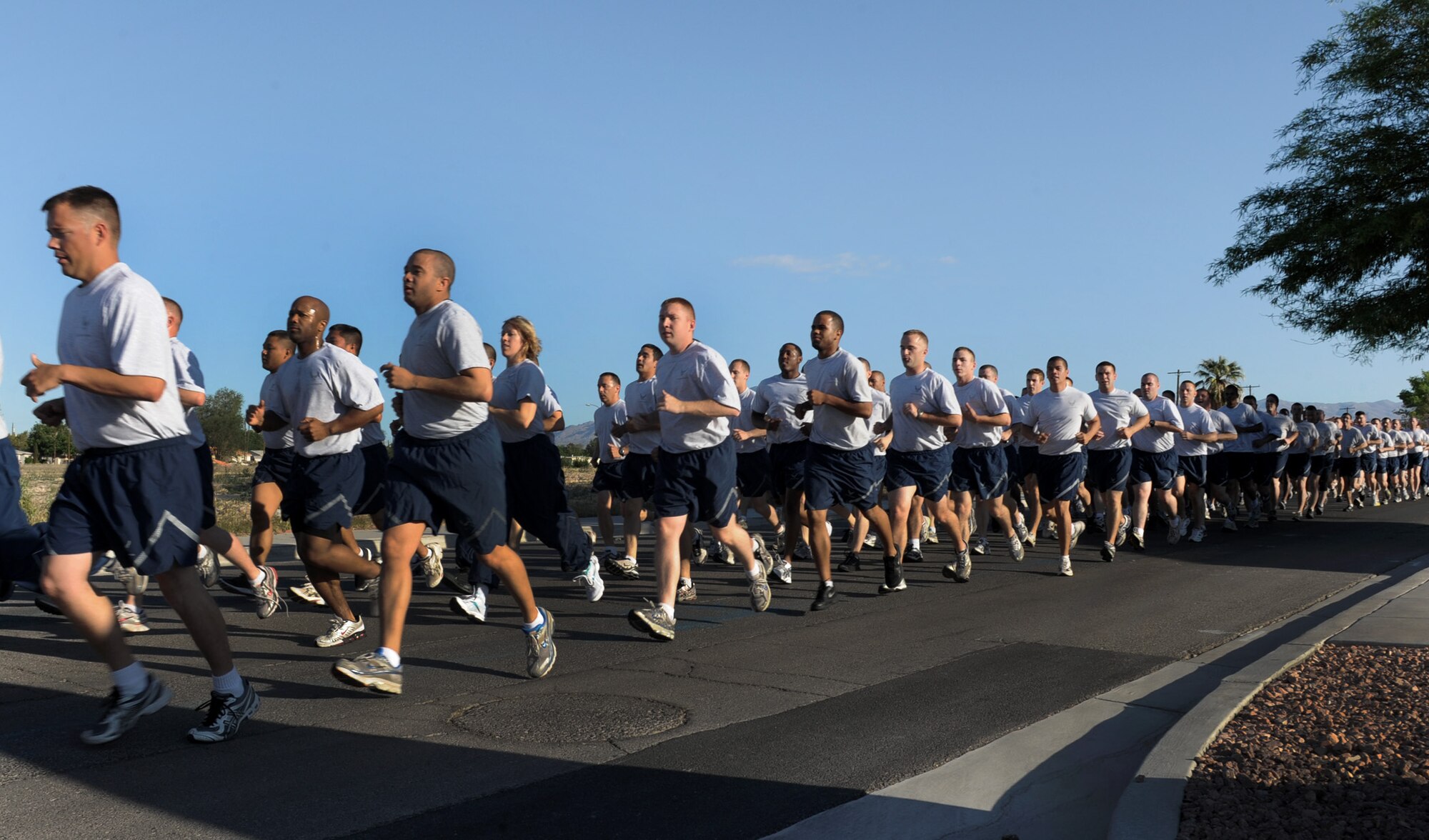 NELLIS AIR FORCE BASE, Nev. -- Members of the 99th Air Base Wing participate in a 1.5 mile run, May 14. The run was coordinated to help raise moral and unit comradery within the wing.  (U.S Air Force Photo / Senior Airman Stephanie Rubi)