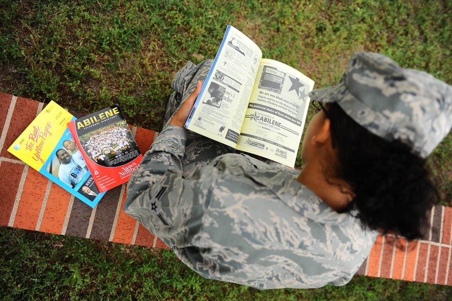 5/3/2010 - DYESS AIR FORCE BASE, Texas -- 2010 Base guides, maps, lithographs and The Real Yellow Pages are available at the 7th Bomb Wing Public Affairs Office studio, suite 136 in the headquarters building. Stop buy and pick yours up today. (U.S. Air Force photo/ Senior Airman Domonique Washington)