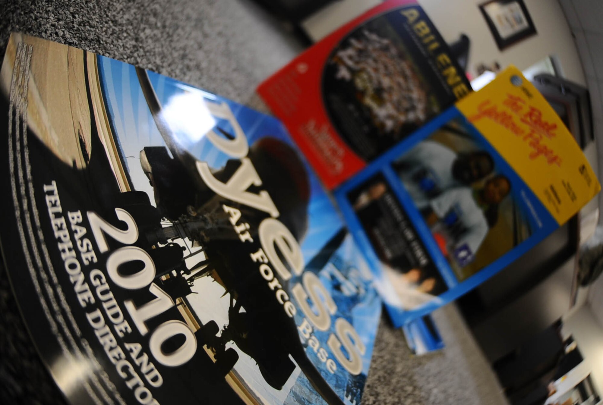 5/3/2010 - DYESS AIR FORCE BASE, Texas -- 2010 Base guides, maps, lithographs and The Real Yellow Pages are available at the 7th Bomb Wing Public Affairs Office studio, suite 136 in the headquarters building. Stop buy and pick yours up today. (U.S. Air Force photo/ Senior Airman Domonique Washington)