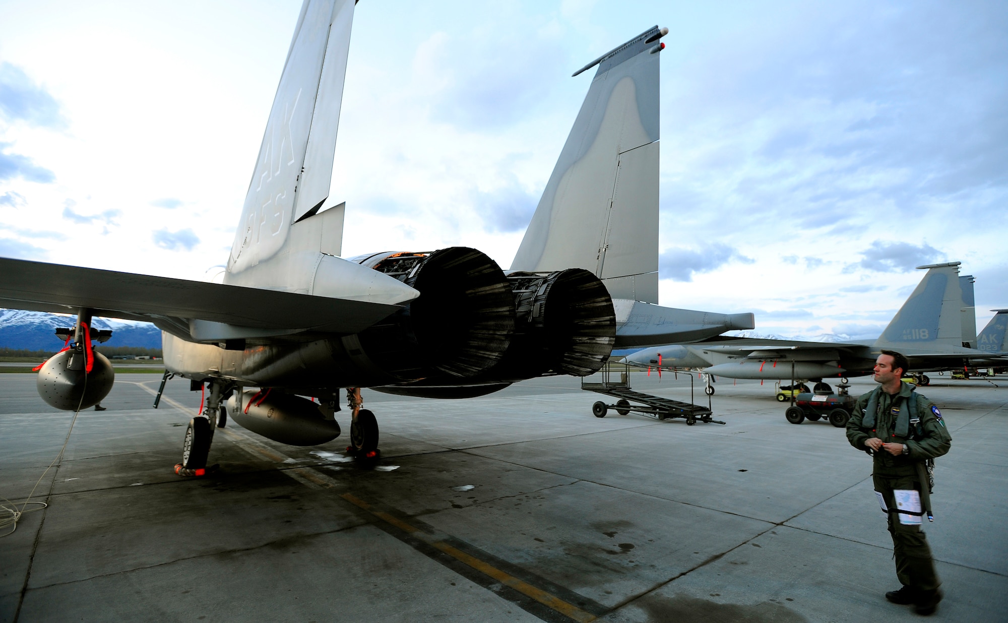 Capt. Ryan Typolt does a walk-around before the 19th Fighter Squadron's F-15 Eagle flagship takes off for the final time at Elmendorf Air Force Base, Alaska, May 13. The aircraft is going to the depot at Robins Air Force Base, Ga., for refurbishing then reassignment.  (Air Force photo by Staff Sgt. Brian Ferguson)