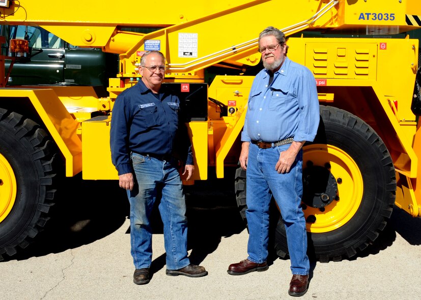 DYESS AIR FORCE BASE, Texas—Johnnie Zumwalt (left) and Philip Forrester, 7th Logistics Readiness Squadron vehicle maintenance technicians, were recognized for their 80 years of combined civil service May 04 here. Mr. Zumwalt and Mr. Forrester have worked together at Dyess since 1987. (U.S. Air Force photo by/ Airman 1st Class Brittney Prescott)