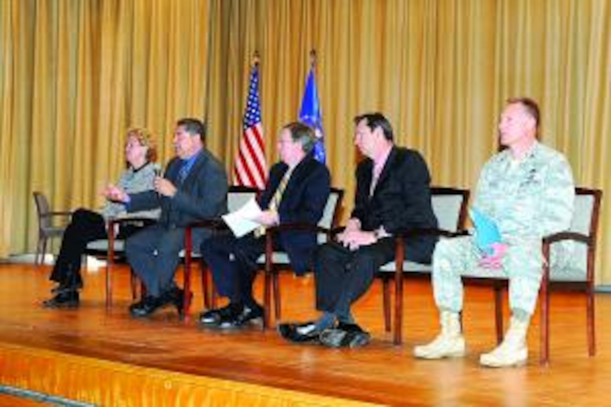 (Left to right) Jo D. Turner, Antonio Perez, Kevin Flinders, Ted Eaton, and Col. Michael Kucej answer questions as members of a logistics town hall panel in regards to career development in the logistics career field April 28. (U.S Air Force photo by Alex Lloyd)