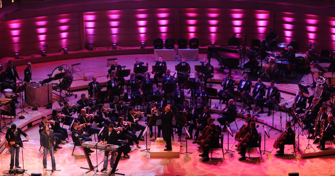 The United States Air Force Band performs with country music group Lonestar, during a dress rehearsal broadcast taping of “America’s Veteran’s – A Musical Tribute” May 13 at the Music Center, Strathmore, Bethesda, Md. Another taping is 8-11 p.m. May 14. The fourth annual broadcast taping features Grammy-award winning singer and songwriter Peter Cetera, “American Idol” finalist Melinda Doolittle, Lonestar, and several Air Force Band performing groups. Award-winning actor Blair Underwood narrates. (U.S. Air Force photo by Thomas Dennis)