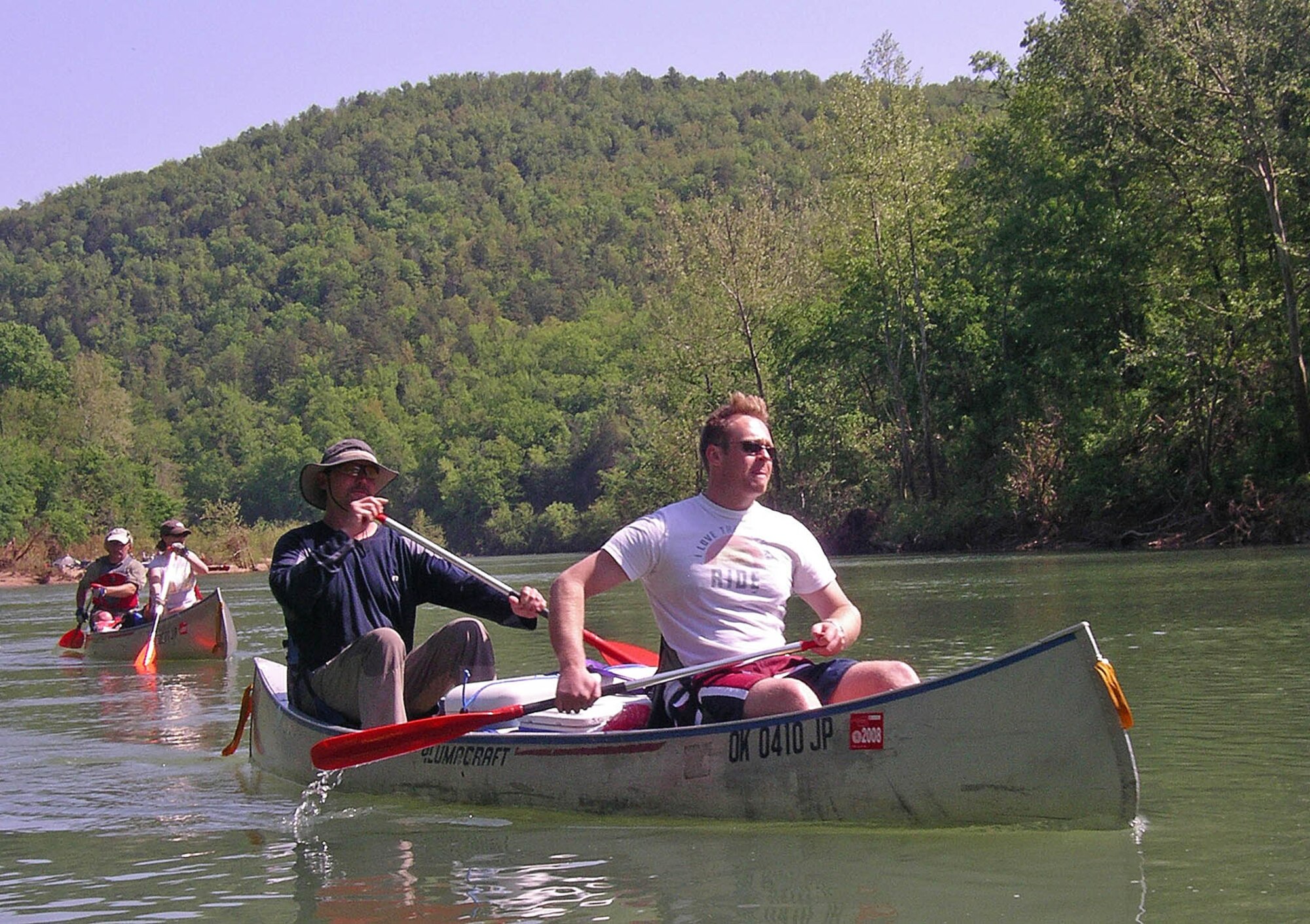 Outdoor enthusiasts Mat Burton, from right, and Erik Jones paddle down Arkansas' Buffalo River on an Outdoor Recreation excursion in 2008. Jones has participated in a number of Outdoor Rec trips and offers his outdoors expertise across the board, from canoeing to mountain climbing. (Courtesy photo)