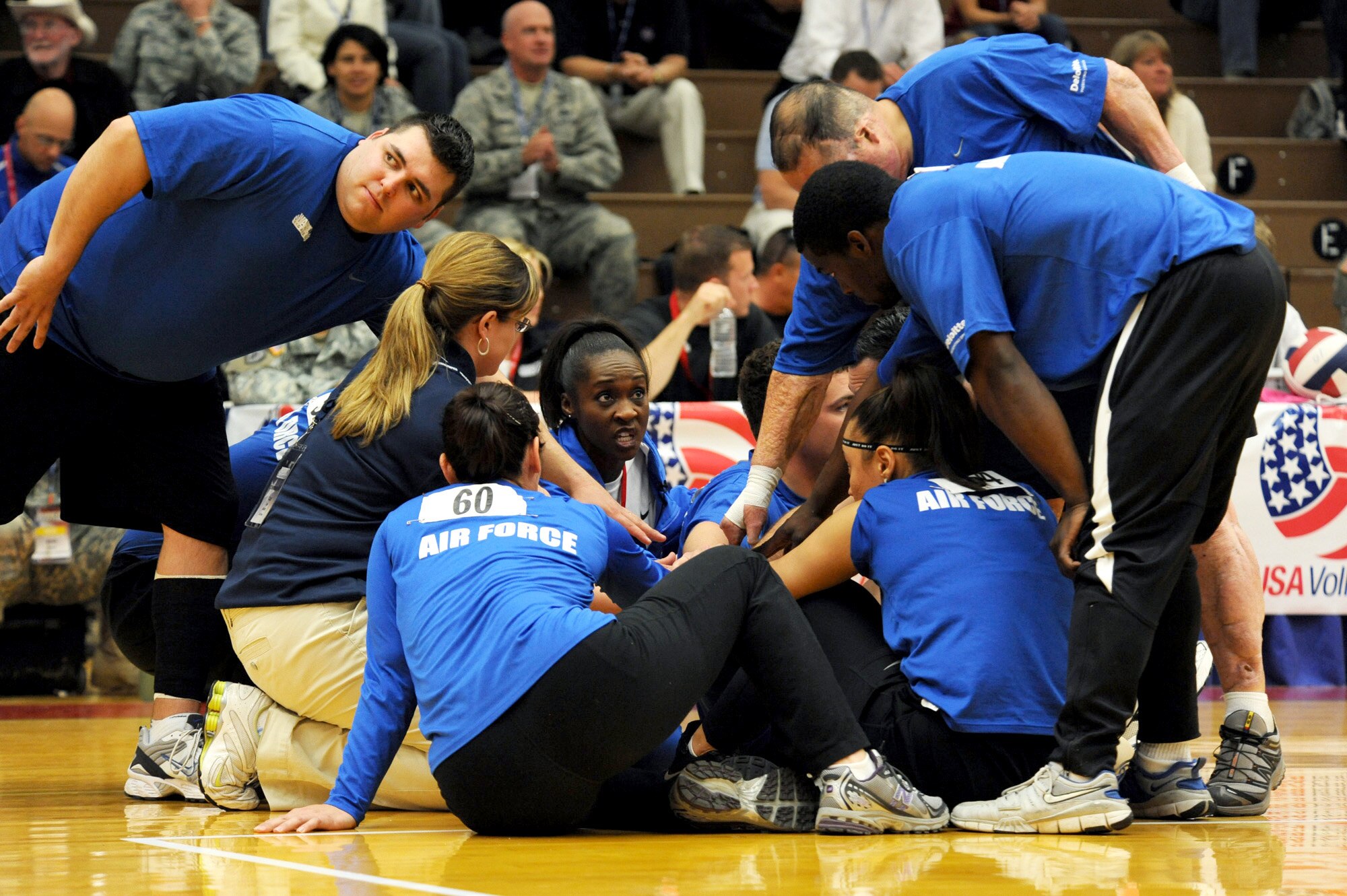 Head Coach Nicki Marino and Tech. Sgt. Elisha Abercrombie give the Air Force team a pep talk during the Warrior Games sitting volleyball match against Army at the U.S. Olympic Training Center in Colorado Springs, Colo., May 13, 2010. (U.S. Air Force photo/Staff Sgt. Desiree N. Palacios)
