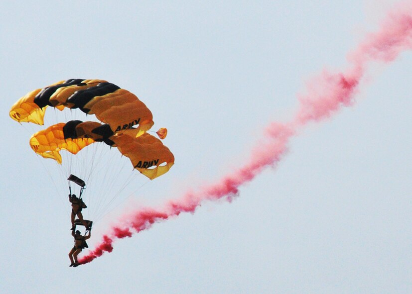 JOINT BASE ANDREWS, MD. -- The Army Golden Knight parachute team performs above the flightline here May 14. The Golden Knights jumped from a C-31A Friendship and conducted aerial maneuvers during their free fall. They are scheduled to perform again May 15 and 16. The 2010 Andrews Air Show is free and open to the public from 8 a.m. to 5 p.m.  (U.S. Air Force photo by Airman 1st Class Kat Lynn Justen)