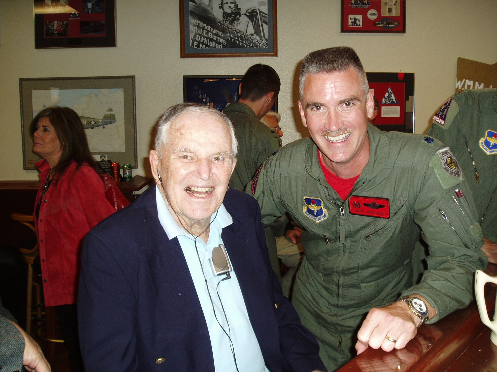 Col. Walker "Bud" Mahurin (ret.) and Lt. Col. Jeffery Lovelace, former 63rd Fighter Squadron commander, pose for a photo during a squadron function at Luke Air Force Base in March 2007.  Colonel Mahurin was part of the 63rd FS during World War II.   (Courtesy Photo)
