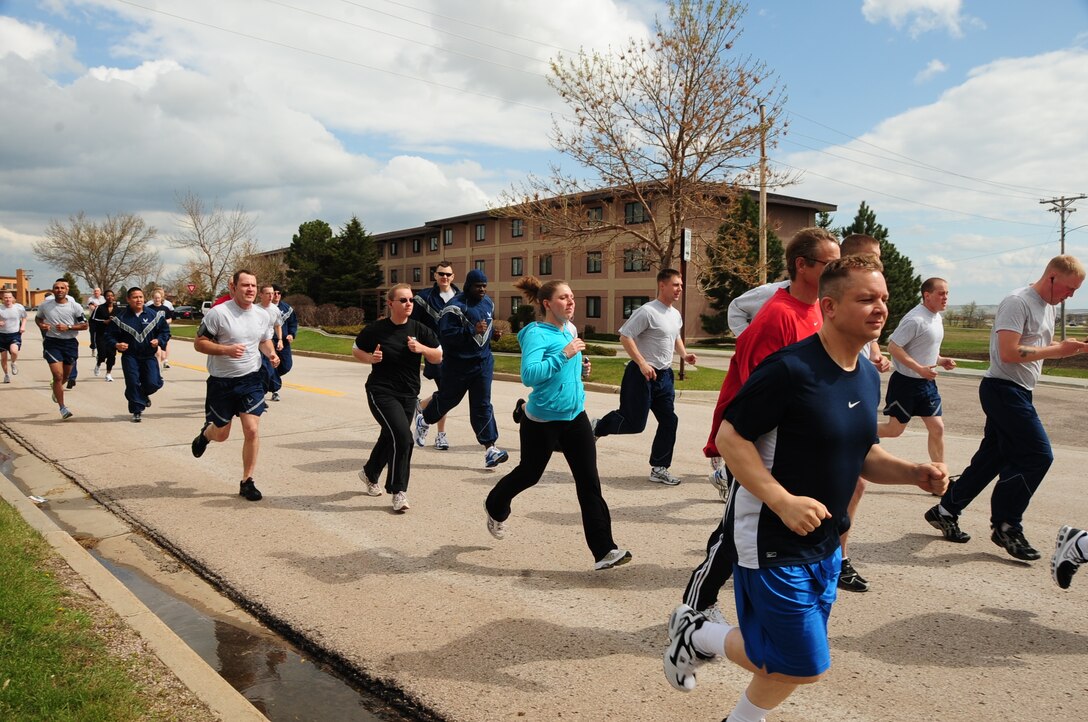 ELLSWORTH AIR FORCE BASE, S.D. -- Airmen from across the base compete in a 5K run during National Police Week, May 13.  A total of 38 individuals started at the Bellamy Fitness Center, looped around the 28th Security Forces Squadron firing range and back. (U.S. Air Force photo/Airman 1st Class Anthony Sanchelli)