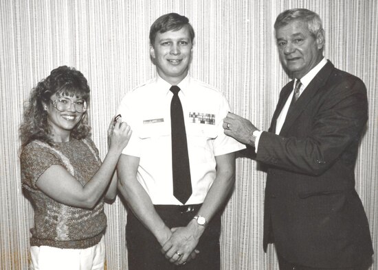 The first Chief Master Sergeant of the Air Force, Paul Wesley Airey, and Pam Clarke promote Vance Clarke to the rank of Technical Sergeant in October 1987. Now Chief Master Sgt. Clarke, Air Force Recruiting Service command chief, retires from the Air Force May 14, after 30 years of service. (Courtesy Photo)