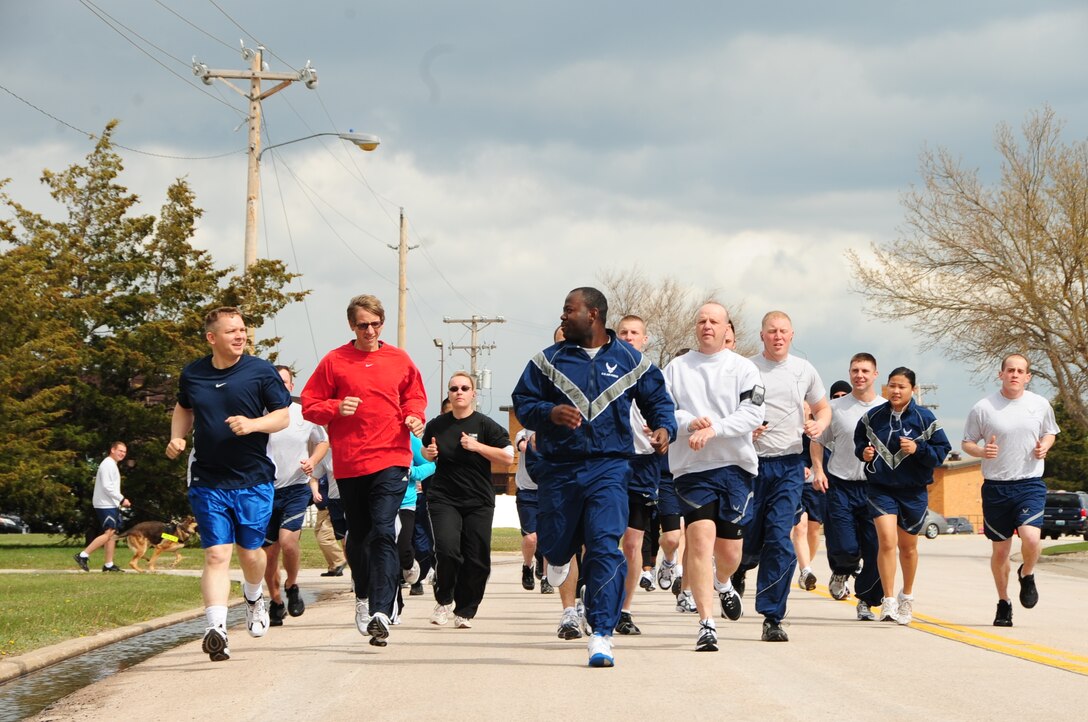 ELLSWORTH AIR FORCE BASE, S.D. -- Airmen from across the base compete in a 5K run during National Police Week, May 13.  The 5K run started at the Bellamy Fitness Center, looped around the 28th Security Forces Squadron firing range and back. (U.S. Air Force photo/Airman 1st Class Anthony Sanchelli)