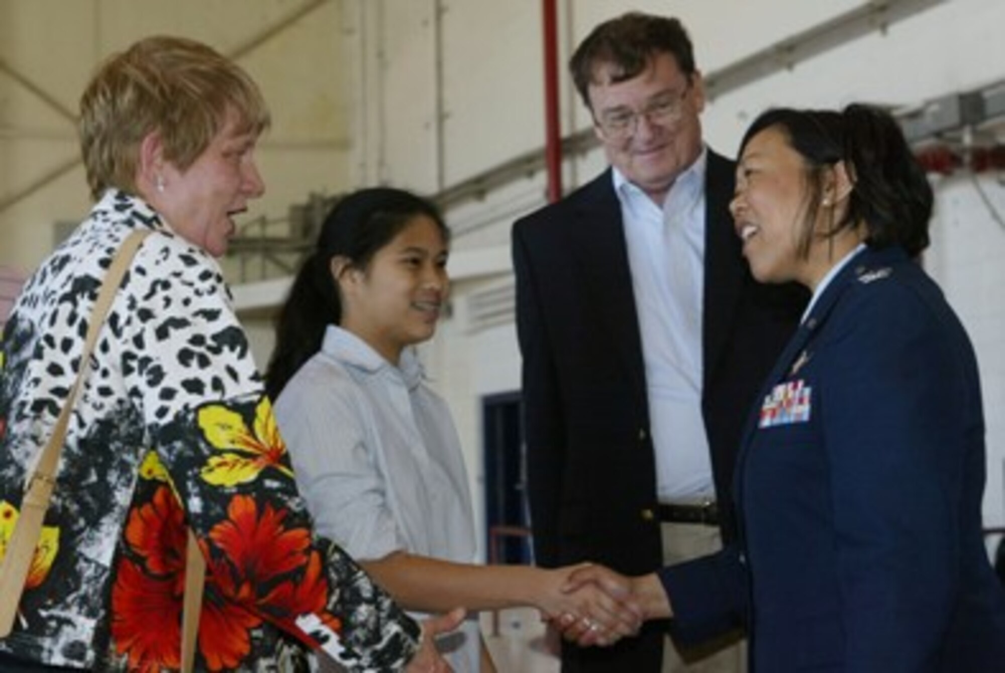 Col. Carolyn Benyshek, Director of Admissions, U.S. Air Force Academy, visits with a student and her family.  Military academy hopefuls and their family members attended the Georgia Congressional Delegation Academy Day here May 8 where they were treated to a series of informational programs designed to assist in the decision-making process.