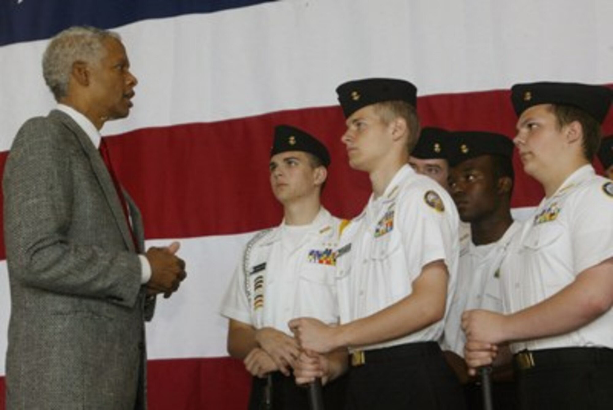 The Honorable Hank Johnson, from the U.S. House of Representatives, takes a moment to speak with members of the Lassiter High School Drill Team prior to the opening of the Georgia's Congressional Delegation Academy Day 2010 held here May 8.