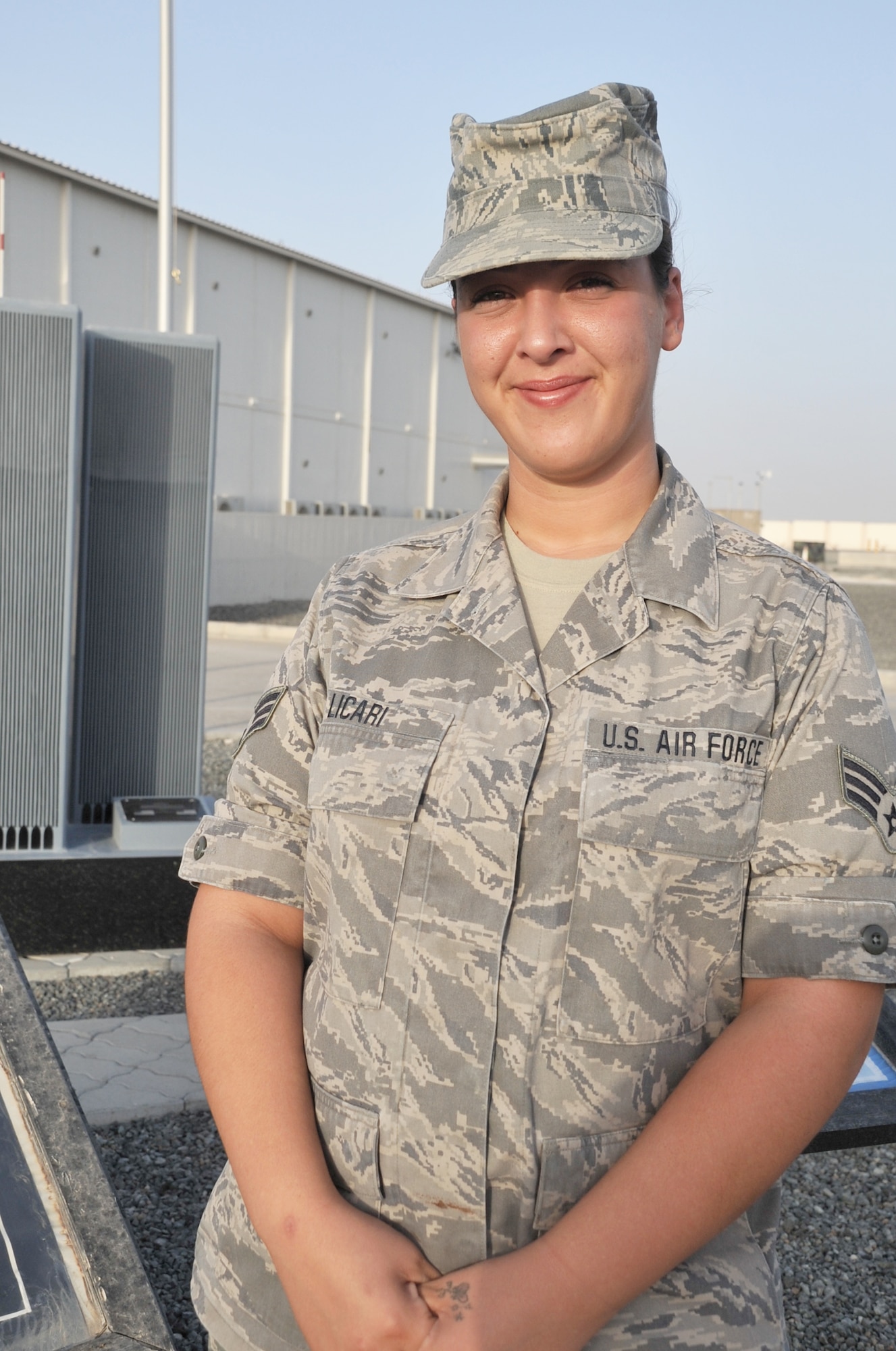 Senior Airman Elizabeth Licari is a services journeyman assigned to the 380th Expeditionary Force Support Squadron at a non-disclosed base in Southwest Asia supporting the 380th Air Expeditionary Wing. Here she is pictured May 13, 2010. Airman Licari is an Air National Guard NCO deployed from the 127th Force Support Squadron at Selfridge Air National Guard Base, Mich. Her hometown is Clinton Township, Mich. As a services journeyman with the 380th EFSS, Airman Licari supports the morale, welfare, fitness and recreation of more than 1,900 deployed service members for the 380th Air Expeditionary Wing. (U.S. Air Force Photo/Master Sgt. Scott T. Sturkol/Released)