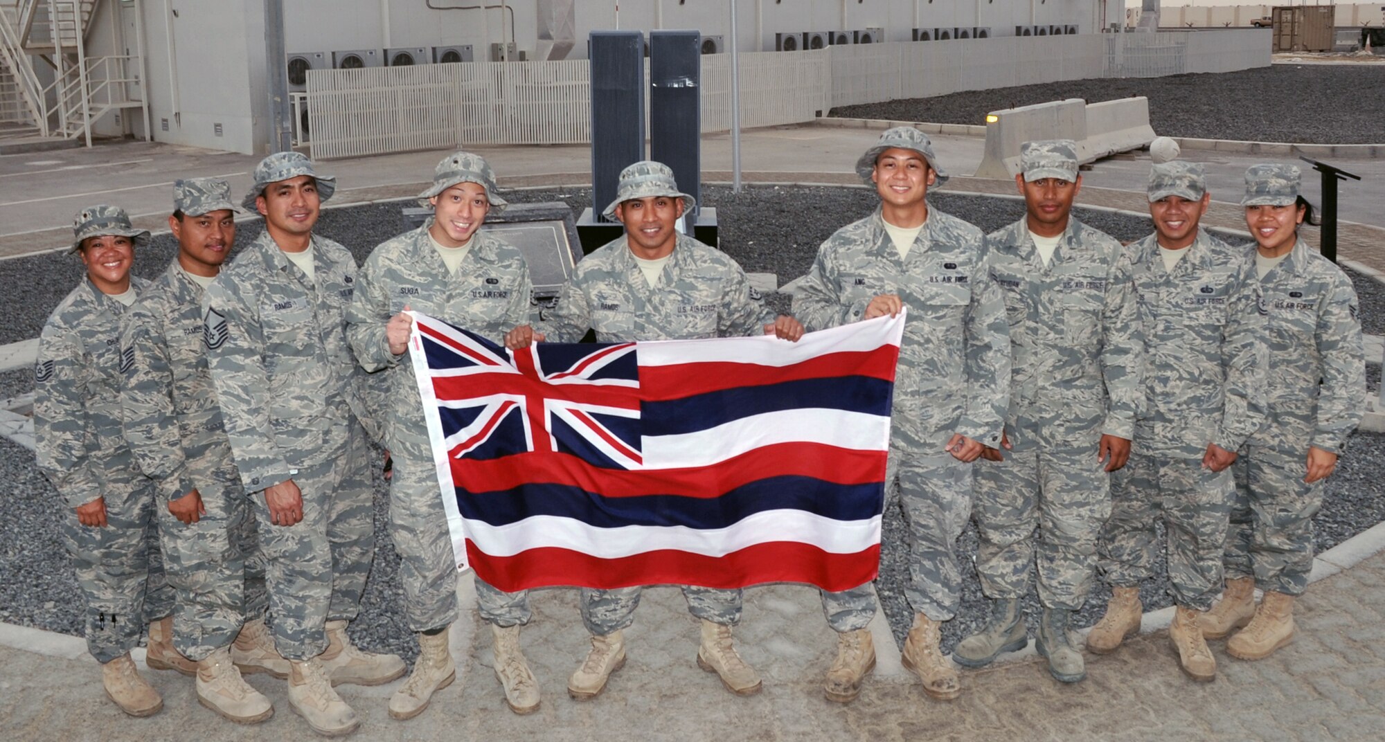 Nine members of the Hawaii Air National Guard's 154th Force Support Squadron are deployed to the 380th Air Expeditionary Wing at non-disclosed base in Southwest Asia.  Here they are pictured May 6, 2010. The Air National Guard Airmen serve with the 380th Expeditionary Force Support Squadron. Pictured are, from left to right, Tech. Sgt. Johnette Chun, Tech. Sgt. Bobby Ramos, Master Sgt. Greg Ramos, Staff Sgt. Justin Suga, Staff Sgt. Gavin Ramos, Airman 1st Class Ryan Ang, Senior Airman Justin Bayudan, Tech. Sgt. Arthur Plateros and Senior Airman Priscilla Llanos. (U.S. Air Force Photo/Master Sgt. Scott T. Sturkol/Released)