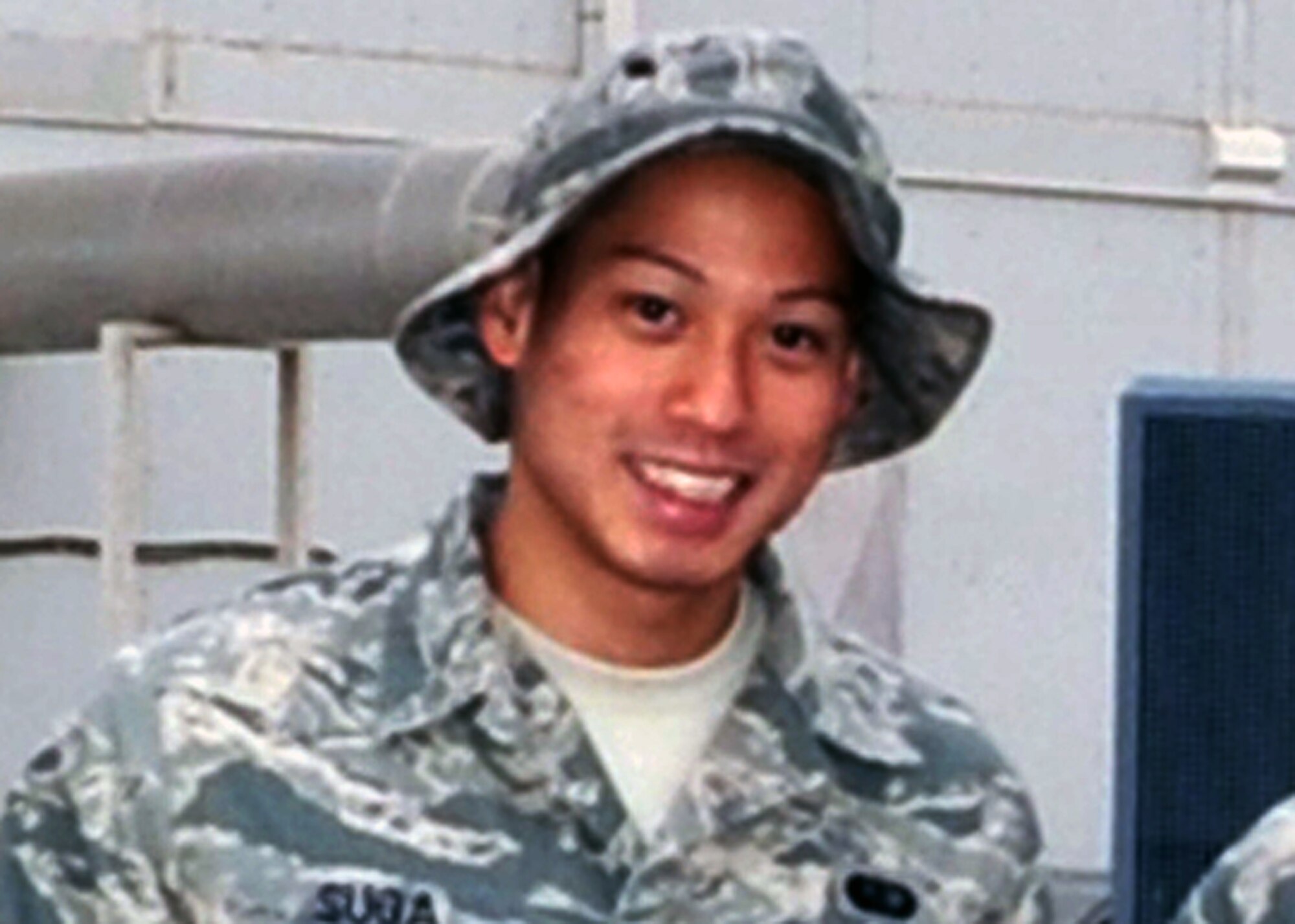Staff Sgt. Justin Suga is a services craftsman with the 380th Expeditionary Force Support Squadron at a non-disclosed base in Southwest Asia supporting the 380th Air Expeditionary Wing. Here he is pictured on May 6, 2010. He is an Air National Guard NCO deployed from the 154th Force Support Squadron at Hickam Air Force Base, Hawaii. (U.S. Air Force Photo/Master Sgt. Scott T. Sturkol/Released)