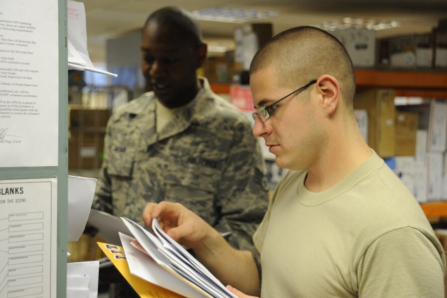 RAF MENWITH HILL, United Kingdom - Senior Airman Dane Butcher-Beaman is the 501st Combat Support Wing Airman of the Month for May. Airman Butcher-Beaman is a postal specialist and is from Lima, Ohio. He was selected because of his can-do attitude and superior customer service.  (U.S. Air Force photo by Staff Sgt. Brok McCarthy)