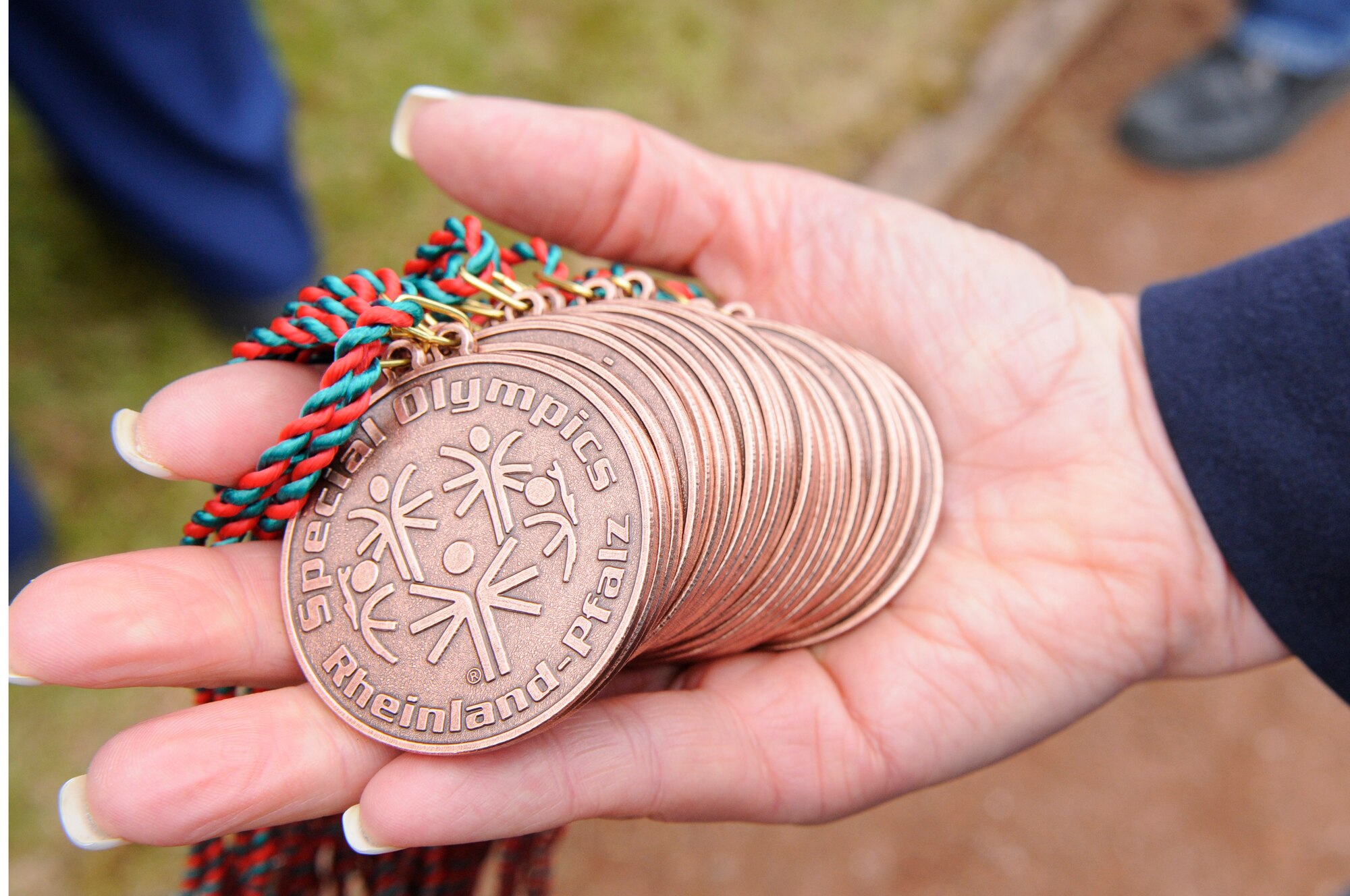 Medallions are displayed during the Special Olympics, Enkenbach-Alsenborn, Germany, May 12, 2010. Special Olympics is a worldwide event for children and adults with disabilities to build confidence and foster friendships. The Kaiserslautern Military Community hosted its 27th Annual Special Olympics for over 800 athletes. (U.S. Air Force photo by Airman 1st Class Brittany Perry)