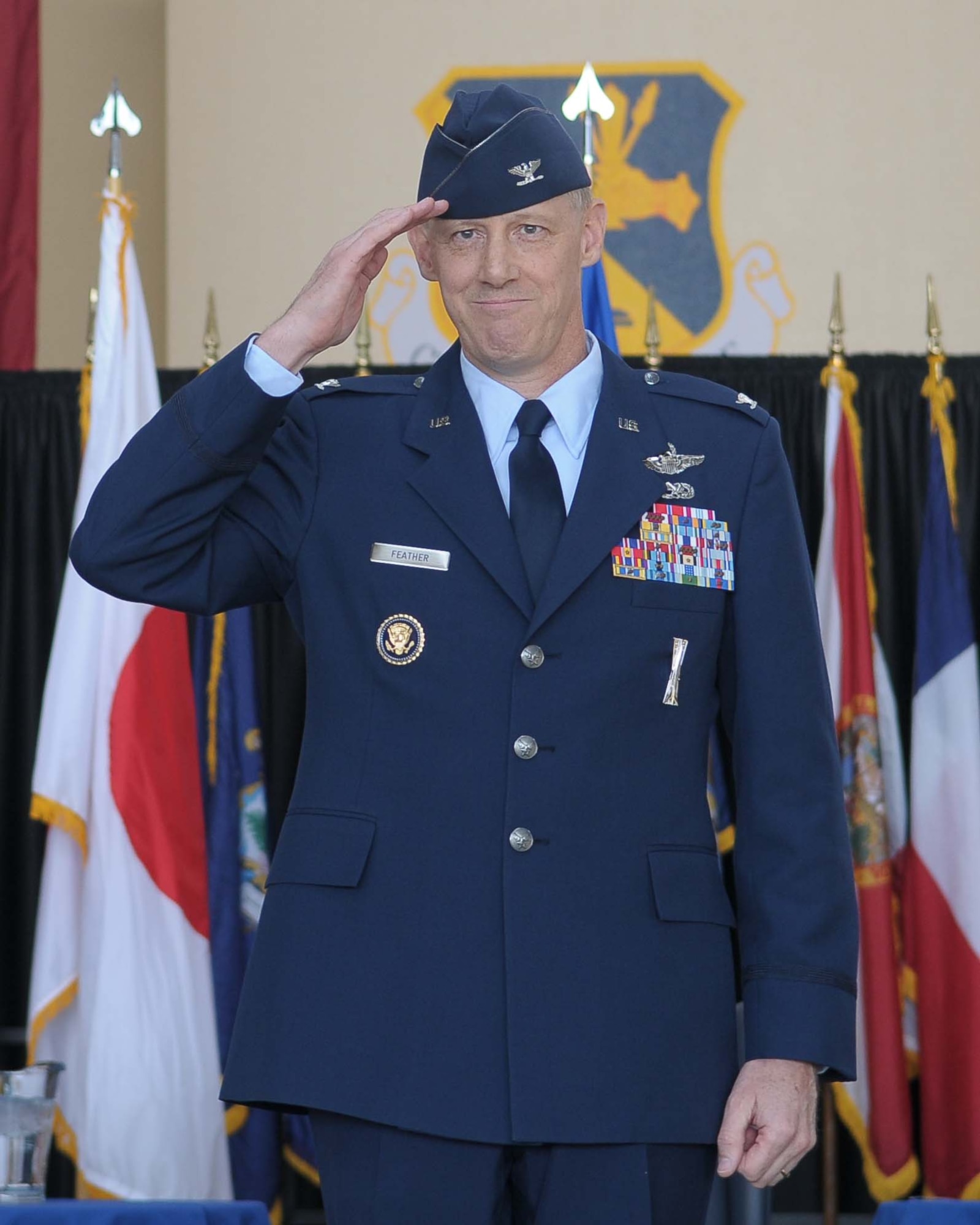 YOKOTA AIR BASE, Japan -- Col. Otto Feather, 374th Airlift Wing commander, issues his first salute to the 374th Airlift Wing during the change of command ceremony here May 14. (U.S. Air Force photo/Airman 1st Class Sean Martin)