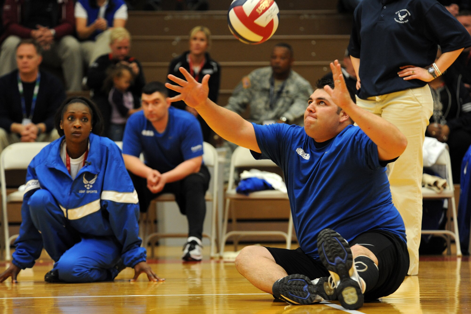 Air Force Warrior Games athlete, Ricky Tackett, prepares to serve the ball during the Warrior Games sitting volleyball match against Army at the U.S. Olympic Training Center in Colorado Springs, Colo., May 13, 2010. (U.S. Air Force photo/Staff Sgt. Desiree N. Palacios) 