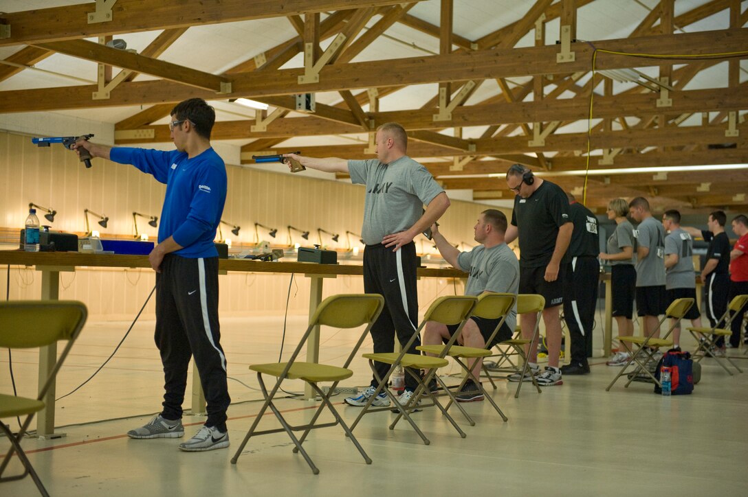 Staff Sgt. Marc Esposito takes aim during the Warrior Games pistol competition May 13, 2010, at the Olympic Training Center in Colorado Springs, Colo. Sergeant Esposito took gold in the event. (U.S. Air Force photo/Senior Airman Christopher Griffin)