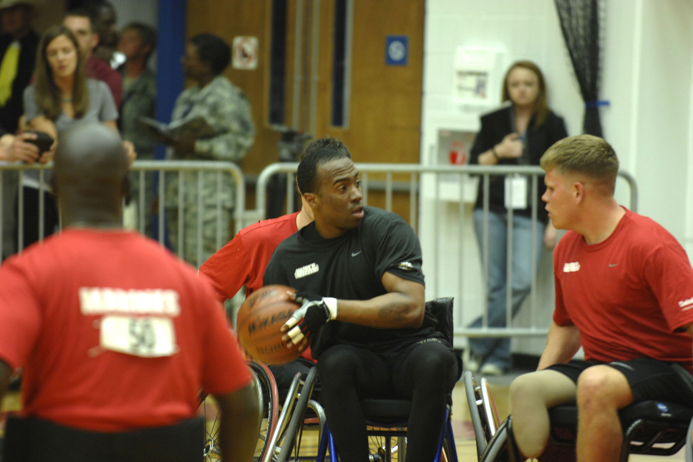 U.S. Army Staff Sgt. Paul Roberts looks to make a move with the ball