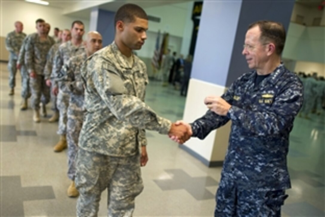 Navy Adm. Mike Mullen, chairman of the Joint Chiefs of Staff, greets soldiers assigned to the 101st Airborne Division preparing to deploy to Afghanistan, May 14, 2010. Mullen, along with Defense Secretary Robert M. Gates and Army Gen. Stanley McCrystal, commander, International Security Assistance Force accompanied Afghanistan President Hamid Karzai to visit soldiers and families assigned on Fort Campbell.
