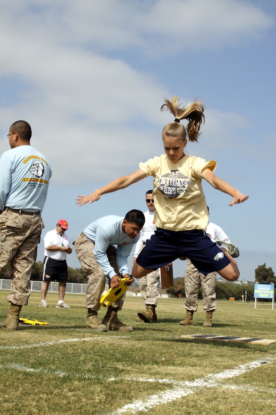 Erin C. Reilly, 16, Bethpage High School, Long Island, N.Y., jumped 7 feet, 3 inches during the 2010 Youth Physical Fitness Championship, May 14, at the depot’s track and soccer field.