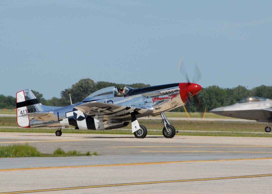 JOINT BASE ANDREWS, Md. - Capt. Dale Snodgrass (Ret.) taxi's his P-51 Mustang after taking part of the U.S. Air Force heritage flight on the opening day of the Joint Service Open House here May 15.  This is the first Joint Service Open House conducted by Team Andrews members at the newly minted Joint Base Andrews, continuing a rich tradition of partnership and strength rooted in service to the nation.  (U.S. Navy photo by Mass Communication Specialist 2nd Class Clifford L. H. Davis)