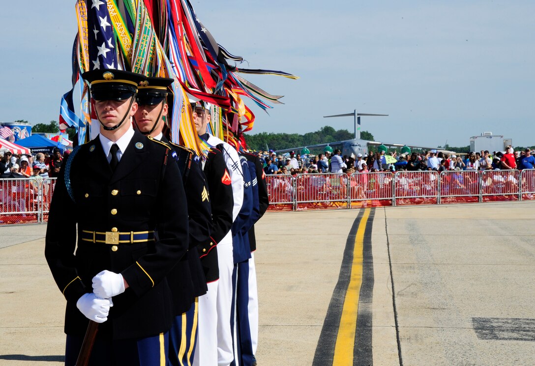 JOINT BASE ANDREWS, Md.- Members of the Joint Forces Honor Guard stands ready to post the colors at the Joint Service Open House opening ceremony here May 15. This year's guest speaker is Lt. Gen. Phillip Breedlove, Deputy Chief of Staff for Air Operations, Plans and Requirements for the Air Force. JSOH honors military tradition while celebrating the exciting future of joint military capabilities. (U.S. Air Force photo by Staff Sgt Keyonna Fennell)