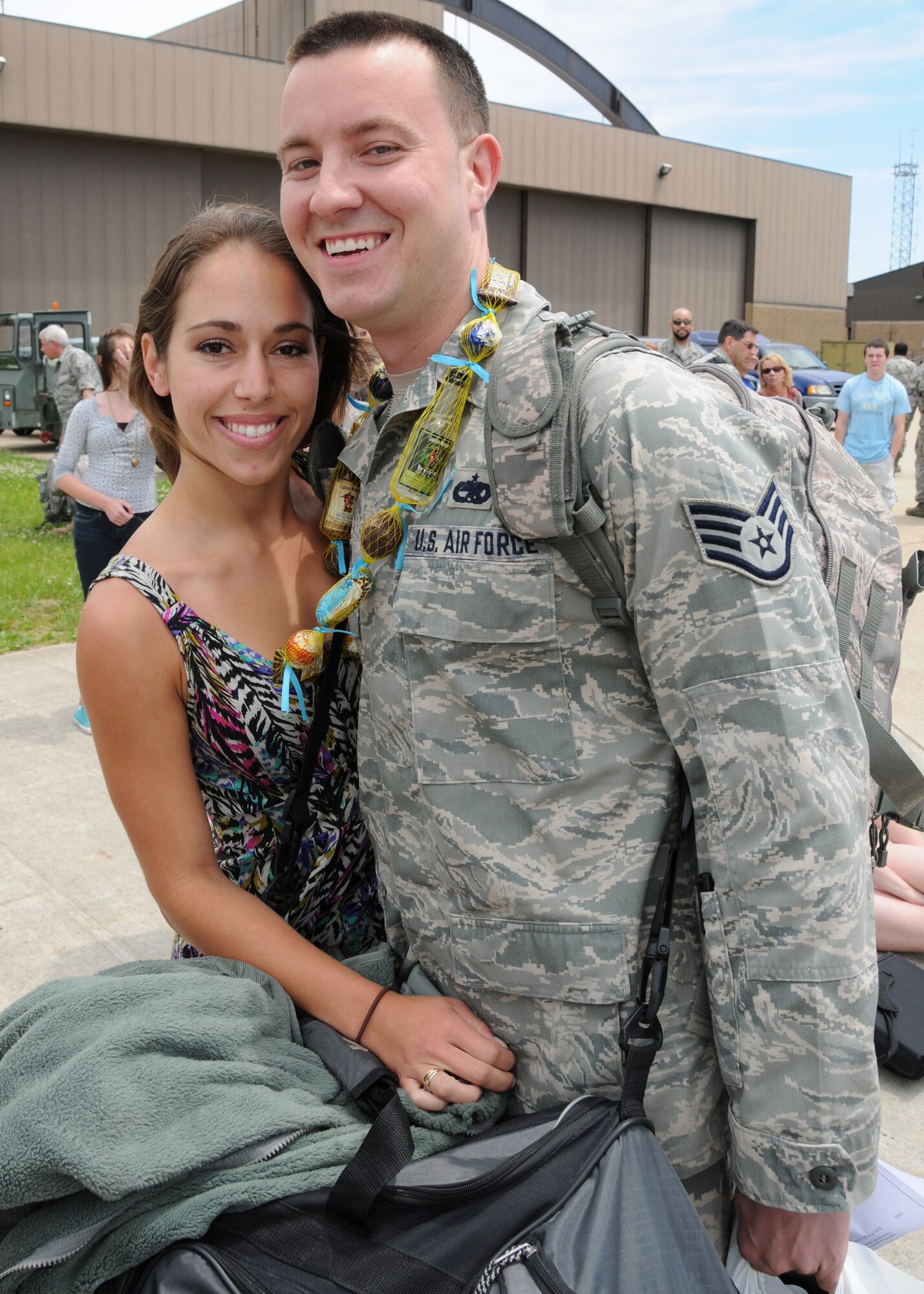 Airmen from the 135th Airlift Group of the Maryland Air National Guard receive a welcome on the flightline on Warfield Air National Guard Base, Baltimore, Md., May 15, 2010.  The 135th supported forces fighting in Afghanistan through transporting of supplies and cargo.  (U.S. Air Force photo by Staff Sgt. Benjamin Hughes/ Released) 