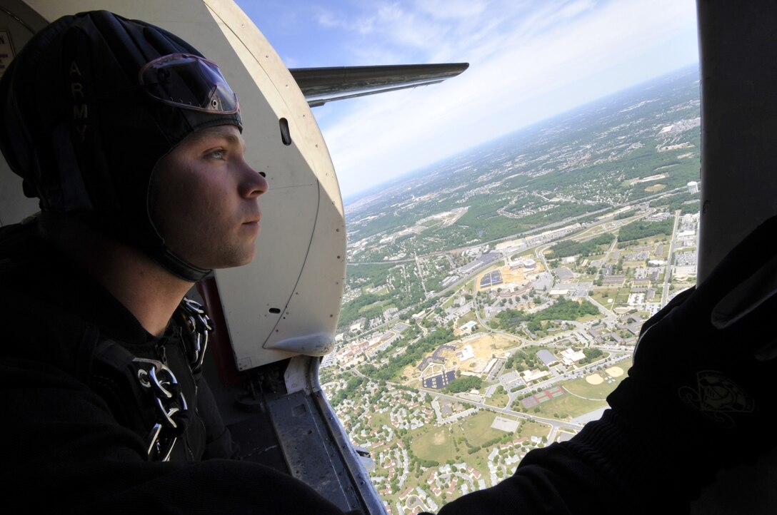 JOINT BASE ANDREWS, Md. - A member of the Army Golden Knights prepares for his jump during the Joint Service Open House here May 15. As one of many demonstrations to be seen at this year's show, thousands of visitors traveled to Andrews to see acts such as the Golden Knights and the Blue Angels. (U.S. Air Force photo by Staff Sgt. Renae L. Saylock)