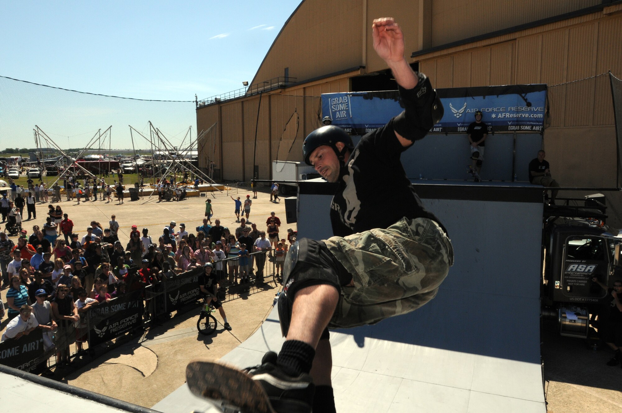 JOINT BASE ANDREWS, Md.-- Jay Stevason, a team skateboarder for ASA Entertainment, hits the ramp at the Joint Service Open House here May 15. Mr. Stevason joins other extreme athletes in supporting the Air Force Reserve recruiting campaign, "Grab Some Air," which aims at attracting an active demographic of 17-34 years old to the Reserve. The JSOH allows members of the public an excellent opportunity to meet and interact with the men and women of the Armed Forces and to show them America’s skilled military. (U.S. Air Force photo by Staff Sgt. Steve Lewis)