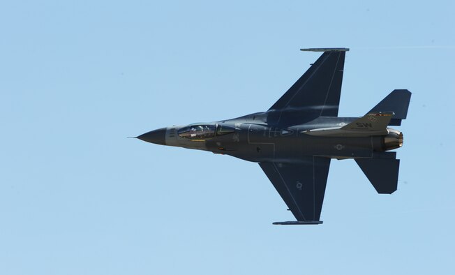 JOINT BASE ANDREWS, Md. -- An F-16 Falcon performs aerial maneuvers for the crowds at the 2010 Joint Service Open House here May 15.  JSOH allows members of the public an excellent opportunity to meet and interact with the men and women of the Armed Forces and to show them America’s skilled military. (U.S. Air Force photo by Staff Sgt. Christopher A. Marasky)