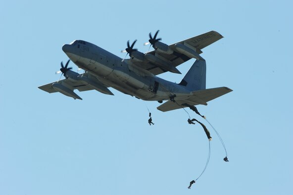 JOINT BASE ANDREWS, Md. -- Army paratroopers jump out of a Marine KC-130 Hercules airplane during the 2010 Joint Service Open House here May 15.  JSOH allows members of the public an excellent opportunity to meet and interact with the men and women of the Armed Forces and to show them America’s skilled military. (U.S. Air Force photo by Staff Sgt. Christopher A. Marasky)
