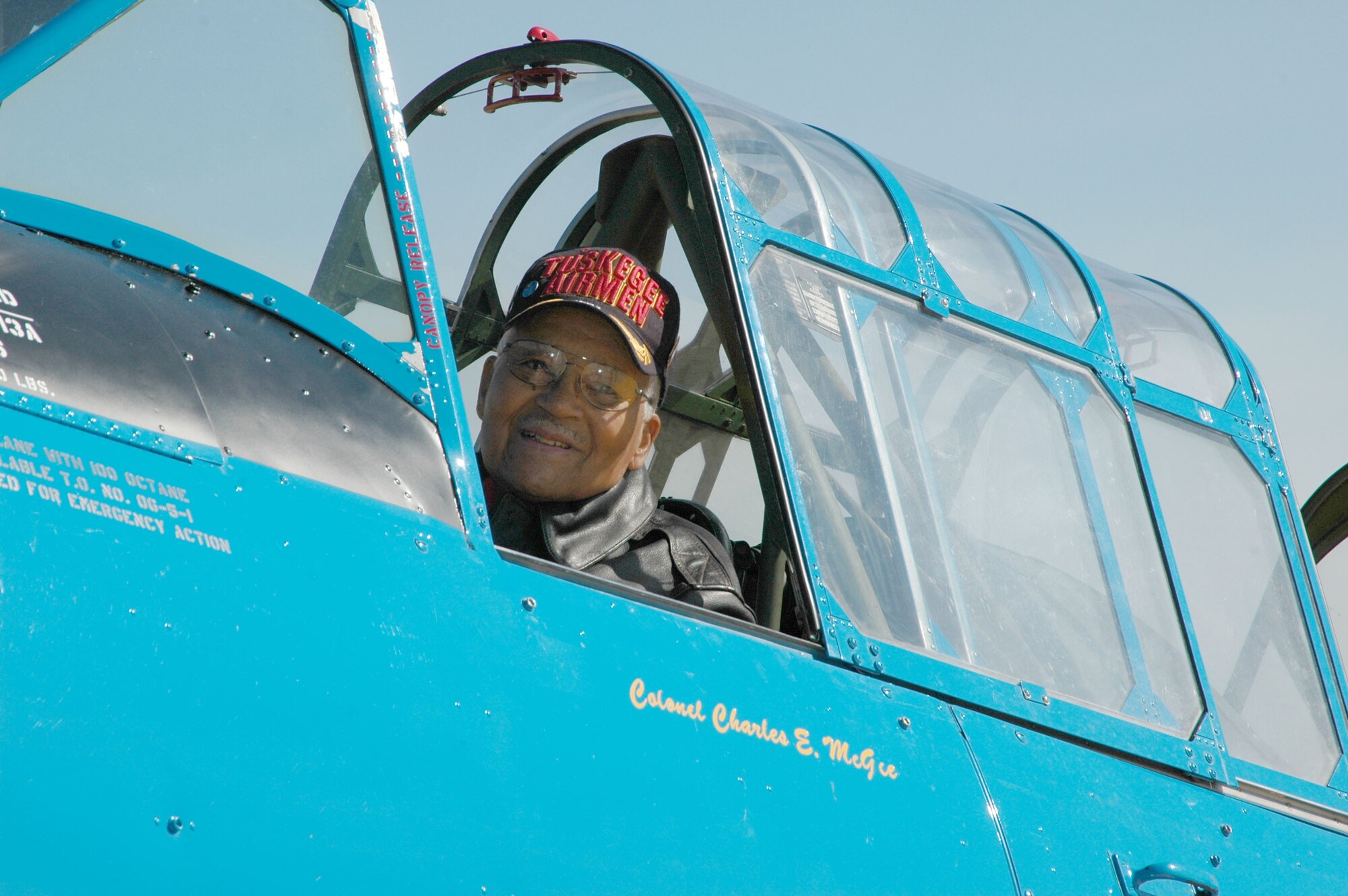 JOINT BASE ANDREWS, Md. - A Tuskegee Airman unveils a BT-13 replica.
(U.S. Navy photo by Mass Communication Specialist 2nd Class George Trian)