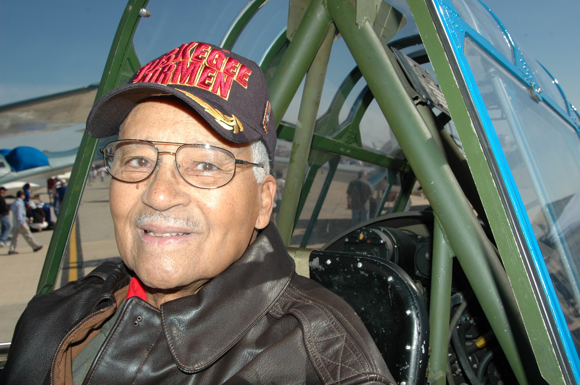 JOINT BASE ANDREWS, Md. - A Tuskegee Airman unveils a BT-13 replica.
(U.S. Navy photo by Mass Communication Specialist 2nd Class George Trian)