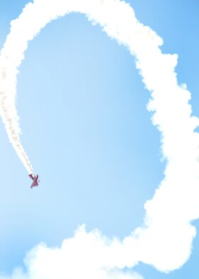 JOINT BASE ANDREWS, Md. -- The GIECO Skytyper streaks white smoke across the sky above the flightline here during the 2010 Joint Service Open House May 15. JSOH offers an opportunity for the public to see military equipment from the Navy, Marines, Army, Air Force, and Coast Guard. (U.S. Air Force photo by Airman 1st Class Kat Lynn Justen)