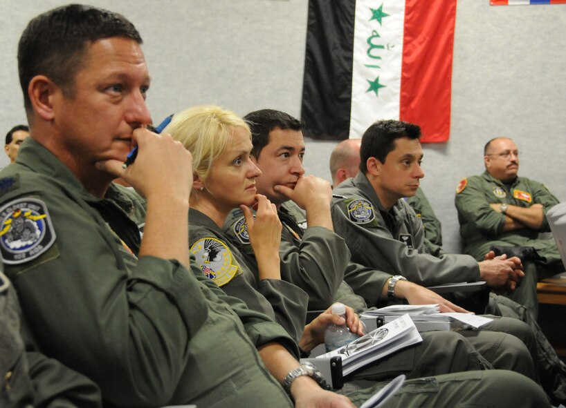 Members of the 102nd Rescue Squadron, and also members of King 1, the primary HC-130 involved in the Space Shiuttle recovery mission listen to pre-brief information being delivered at an auditorium at Patrick Air Force Base, Fla. Members of the 101st, 102nd and 103rd from the 106th Rescue Wing in F.S. Gabreski, N.Y, came to Patrick Air Force Base to support provide rescue support for NASA?s Shuttle Support Mission, STS-132. On May 13, 2010, the 106th Rescue Wing members joined members of the Navy, Marine Corps and Coast guard at an auditorium on Patrick Air Force Base to discuss the details of the next day?s mission.

(U.S. Air Force photo/Staff Sgt. David J. Murphy/Not Released)